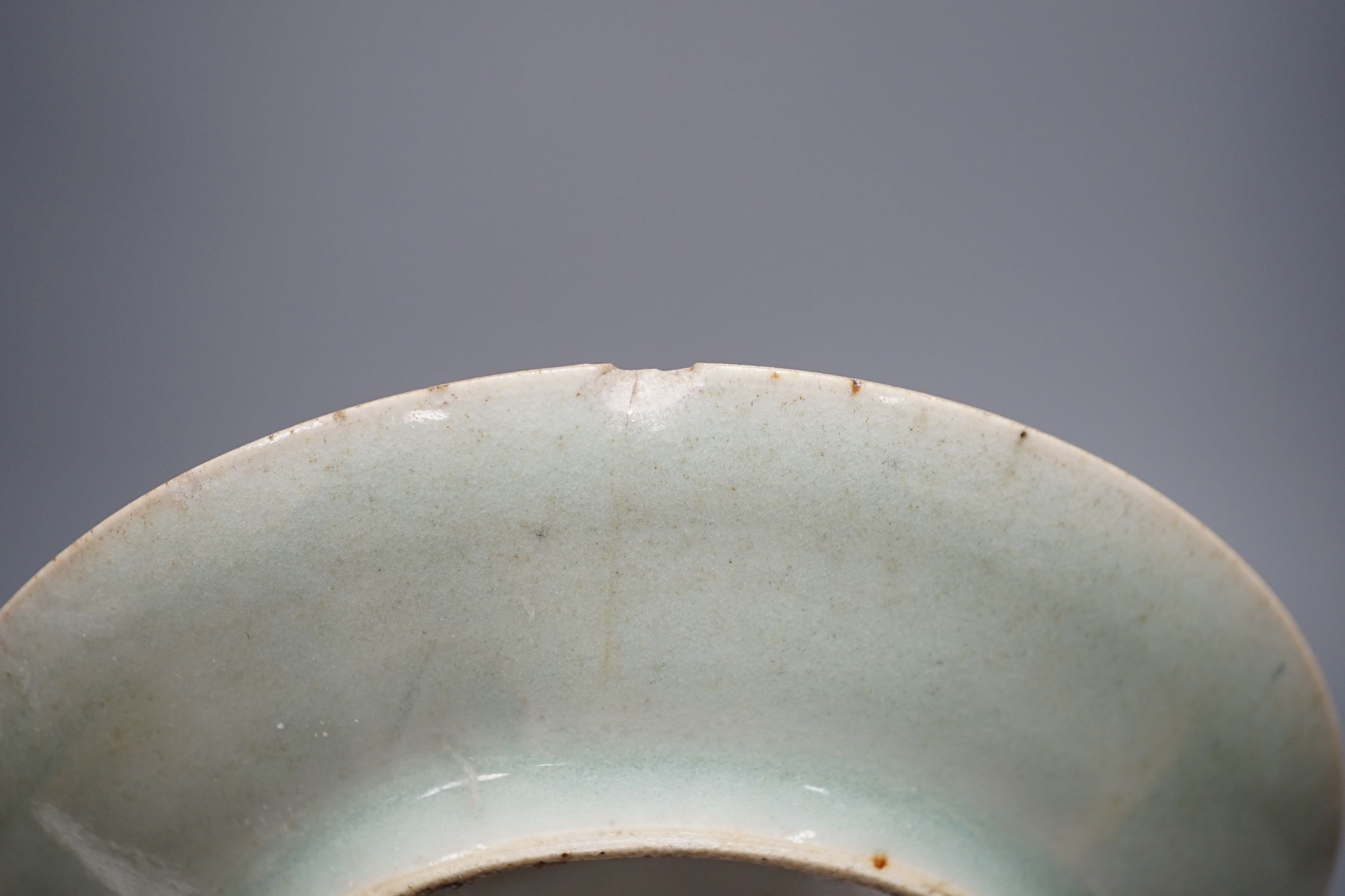 A Chinese export blue and white dish, 13cm, similar vase, a miniature crackle ware vase and a celadon saucer